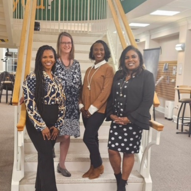  Photo of school counselors and Dr. Joyner